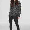 High Rise Coated Skinny Jeans