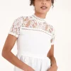 Lace Trimmed Peplum Top