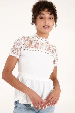 Lace Trimmed Peplum Top